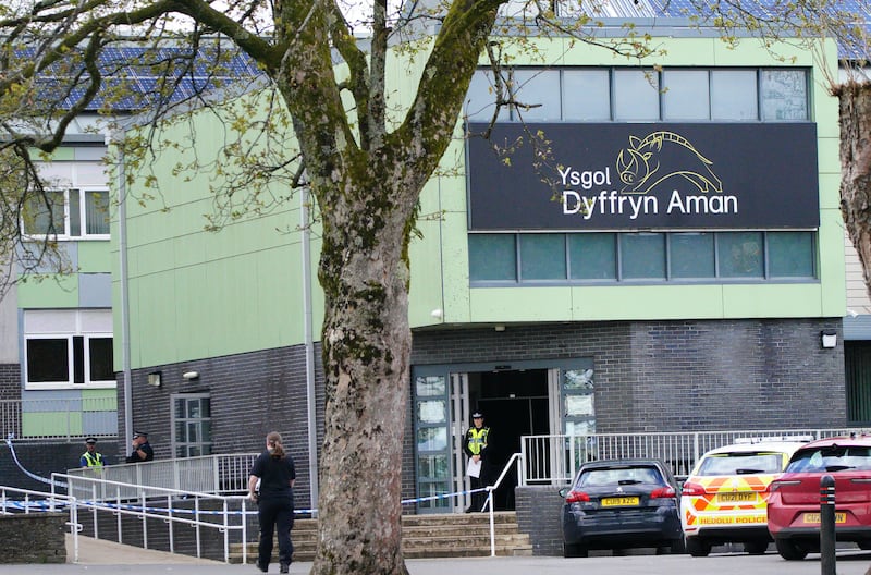 Police at Amman Valley school, in Ammanford, Carmarthenshire in April 2024