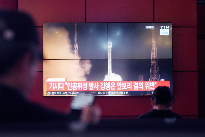 A TV screen shows North Korea’s rocket launch (Ahn Young-joon/AP)