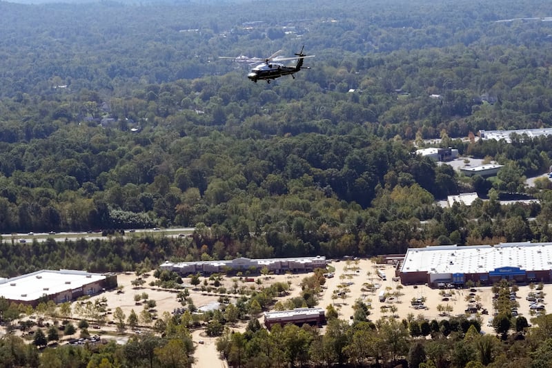 Marine One, with President Joe Biden on board, flies over areas impacted by Hurricane Helene (Susan Walsh/AP)