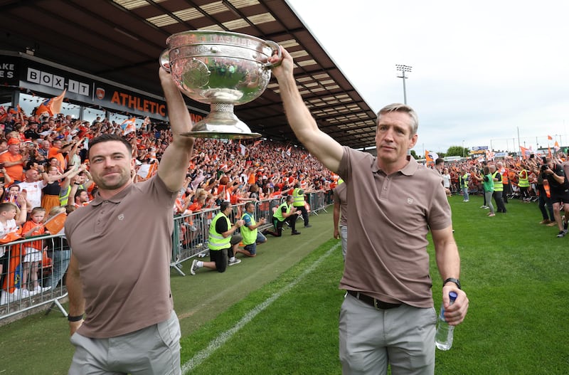 Armagh celebrate  with the fans at the Athletic grounds in Armagh on Monday, after winning the All Ireland.
PICTURE COLM LENAGHAN