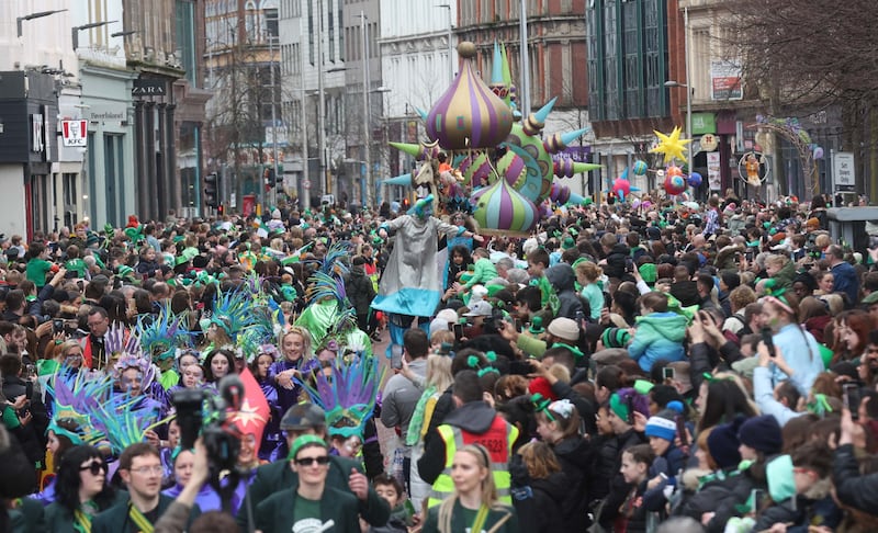 Performers entertain the crowd as  Thousands line the streets for the St Patrick’s day Parade in Belfast on Sunday.
PICTURE COLM LENAGHAN