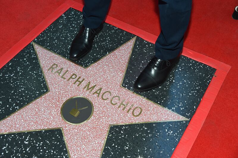 Ralph Macchio is the first to stand on his star during a ceremony honouring him (Richard Shotwell/Invision/AP)