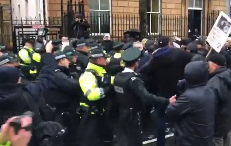 There were scuffles outside court ahead of the appearance of the man charged with the murder of journalist Lyra McKee. Picture by Q Radio&nbsp;