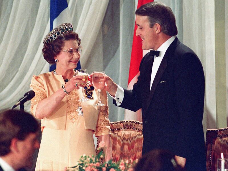 Queen Elizabeth II toasts Canadian Prime Minister Brian Mulroney in Quebec City in 1987 (Ron Poling/The Canadian Press via AP)