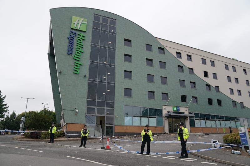 Police guarding the hotel after the riot