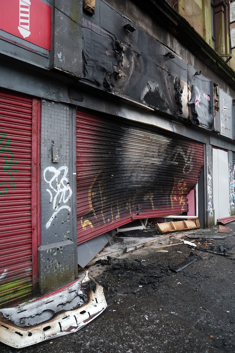 Damaged caused to a salon in North Street, Belfast when a van was rammed into it and set on fire. PICTURE: MAL MCCANN