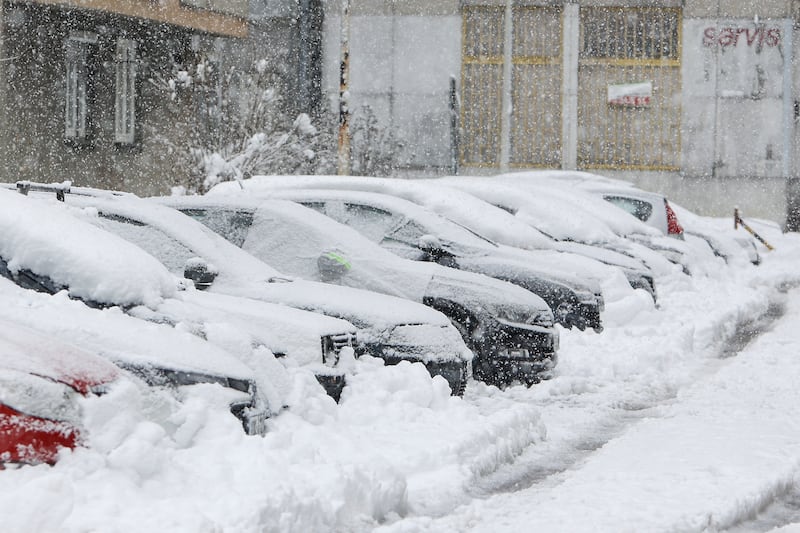 Cars are seen covered with snow during heavy snowfall (AP Photo/Edvin Zulic)