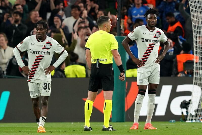 Bayer Leverkusen’s Jeremie Frimpong (left) and Edmond Tapsoba appear dejected during the Europa League final in Dublin
