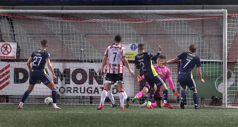 Harry Wood scores the only goal of  the game in Shelbourne's 1-0 win over Derry City on Friday night which was enough to give the north Dublin side the league title
Picture: Margaret McLaughlin