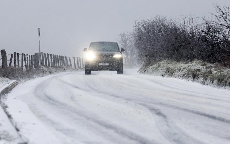 Snow Showers on the outskirts of West Belfast on Thursday morning.
PICTURE; COLM LENAGHAN