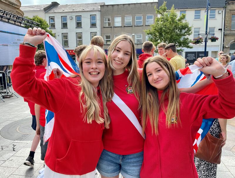 Members of Bann Rowing Club, (left to right) 15 year old Hannah Nicholl, Lydia Quigley and Erin McAleer in the centre of Coleraine at an Olympic big screen watch-along event for the final of the women’s quadruple sculls