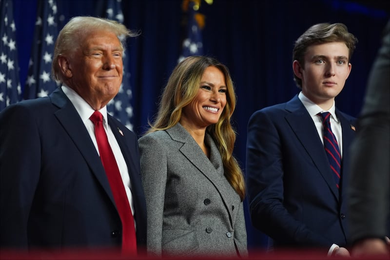 Donald Trump, former first lady Melania Trump and their son Barron Trump (Evan Vucci/AP)