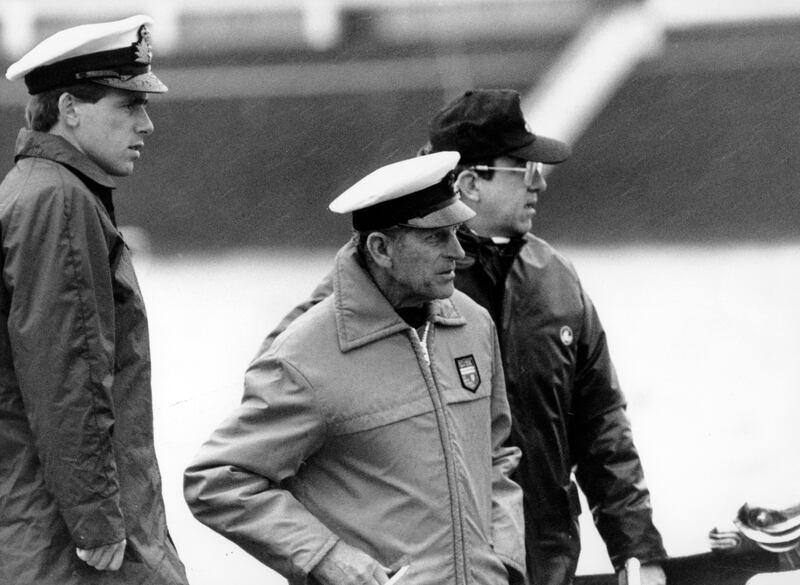 Prince Philip and ex-King Constantine of Greece aboard a launch off the Isle of Wight in 1986