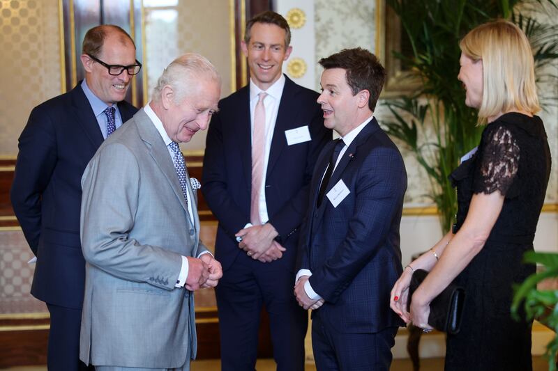The King meeting TV presenter Declan Donnelly and his wife Ali Astall at a Prince’s Trust event at the Palace earlier on Wednesday