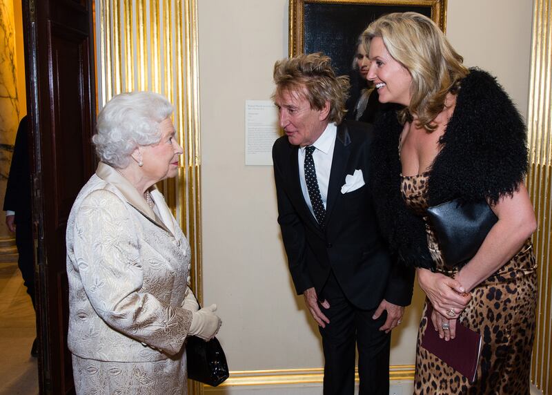 The late Queen Elizabeth II meeting Sir Rod and his wife Penny during an award ceremony at the Royal Academy of Arts in 2016