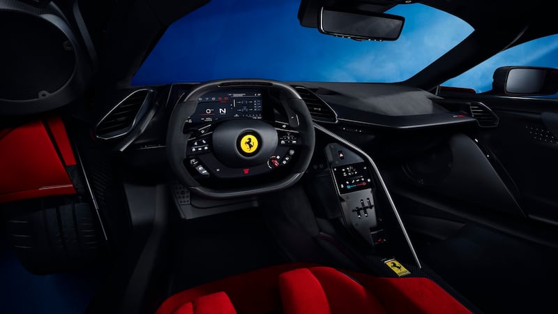 The dashboard is angled towards the driver. (Ferrari)