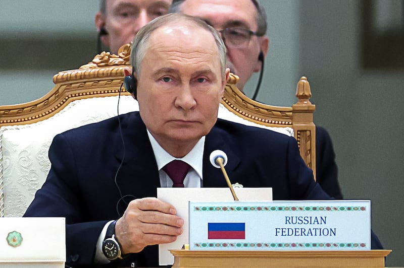 Vladimir Putin delivers his speech at the conference (Sergei Bobylev, Sputnik, Kremlin Pool Photo via AP)