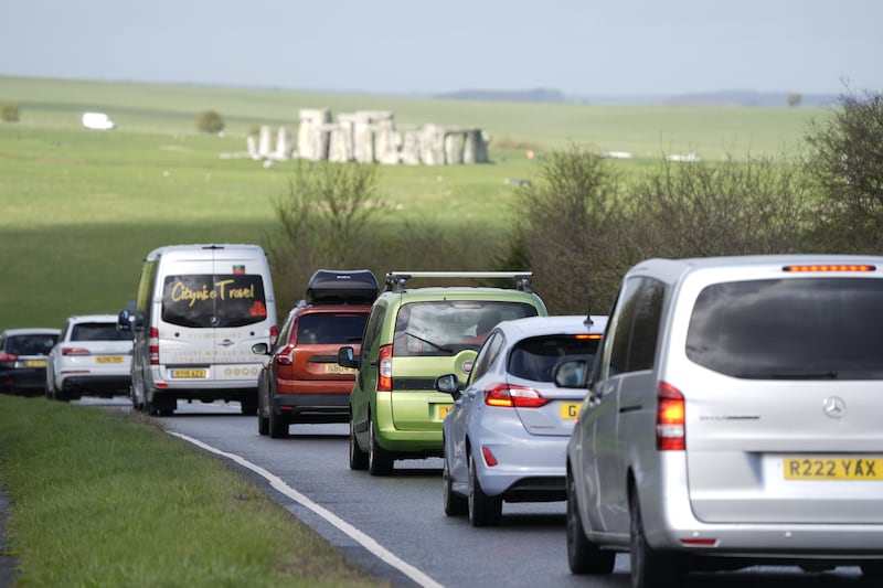 Cars make their way along the A303 past Stonehenge in Wiltshire
