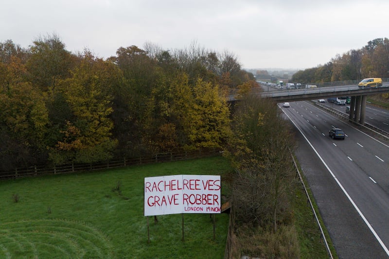 A sign in a field by the M40 near Warwick, protesting against changes to inheritance tax rules in the recent Budget