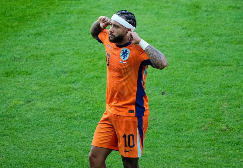 Memphis Depay looked to have salvaged a draw for the Netherlands (Petr David Josek/AP)