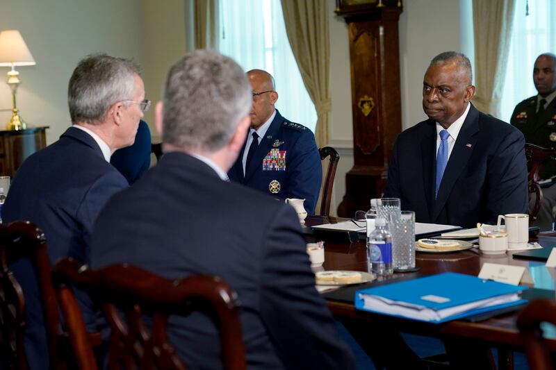 US defense secretary Lloyd Austin, right, listens during a meeting with Nato secretary-general Jens Stoltenberg, left, at the Pentagon in Washington (Susan Walsh/AP)