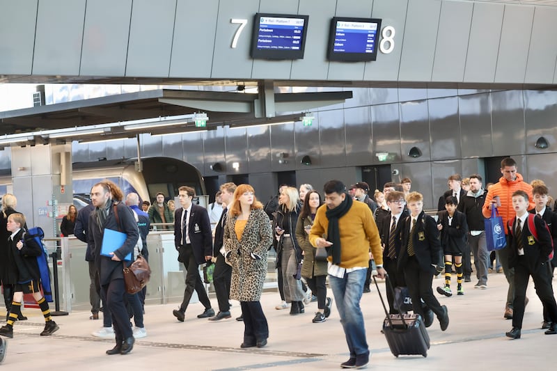 Train passengers arrive and depart from Grand Central Station in Belfast. PICTURE: MAL MCCANN