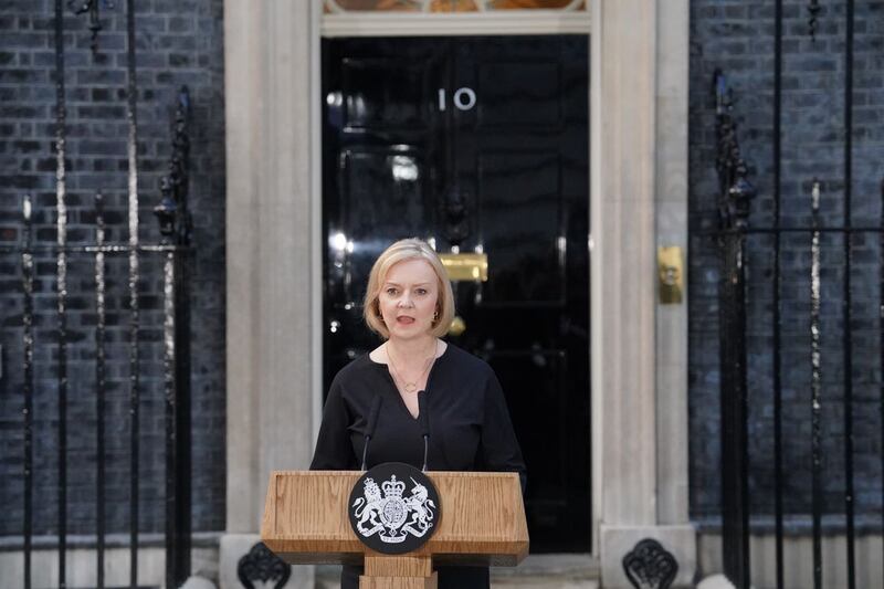 Prime Minister Liz Truss reads a statement outside 10 Downing Street following the death of the Queen