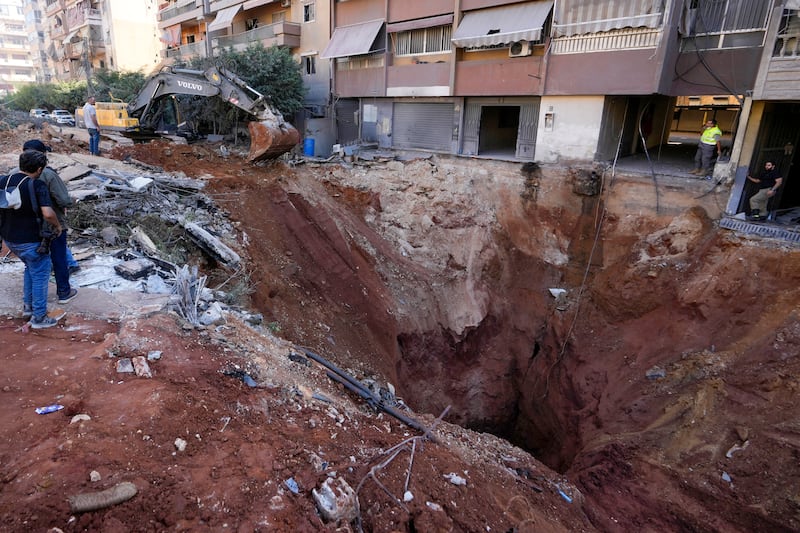 A hole in the ground near the site of the airstrike which killed Hezbollah leader Hassan Nasrallah in Beirut’s southern suburbs (Hassan Ammar/AP)