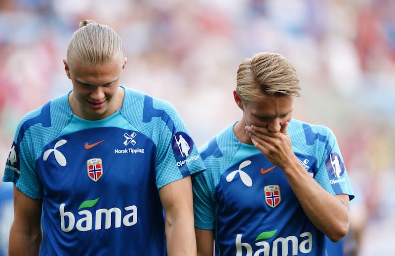 Premier League pair Erling Haaland (left) and Martin Odegaard will not be at the Euros after Norway failed to qualify.