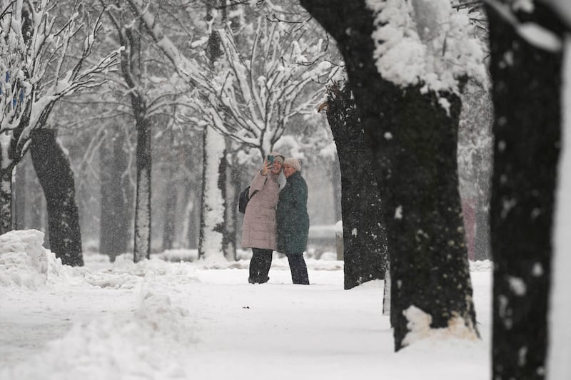 The heavy snow has caused major disruption (AP Photo/Darko Vojinovic)