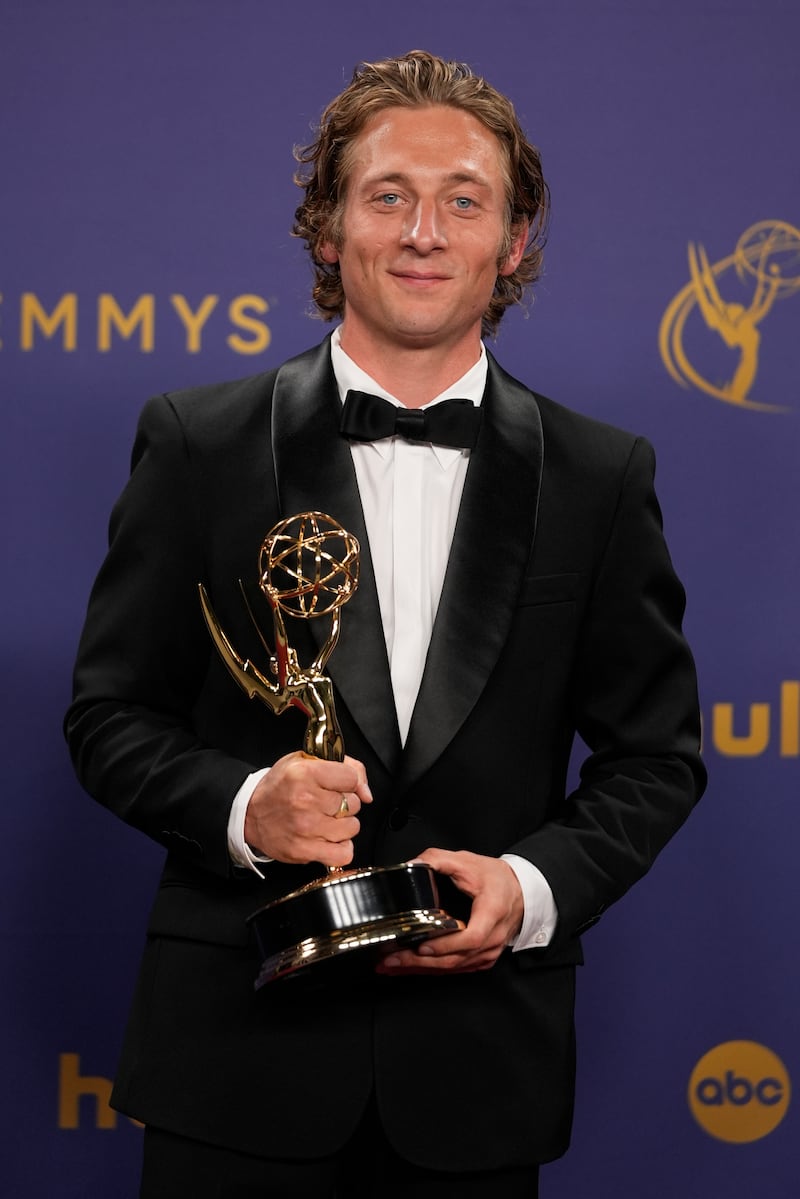 Jeremy Allen White, winner of the award for outstanding lead actor in a comedy series for The Bear, poses in the press room during the 76th Primetime Emmy Awards (Jae C Hong/AP)