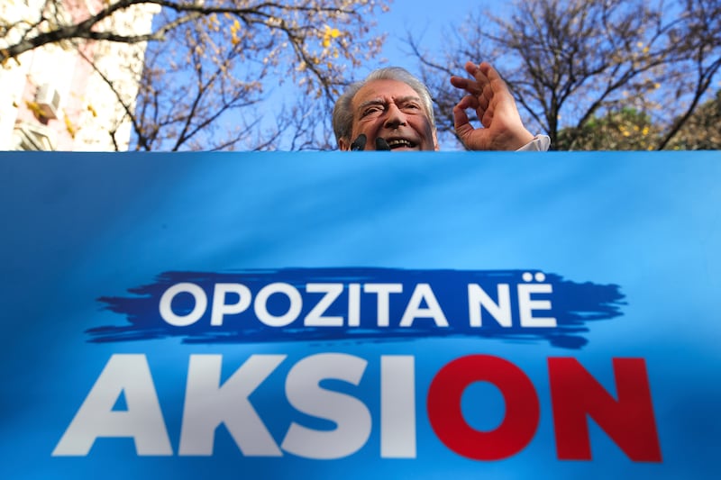 Sali Berisha, 79, the main leader of the center-right Democratic Party, delivers a speech to hundreds of protesters during an anti-government rally outside the Parliament building in Tirana, Albania on Monday (Armando Babani/AP)