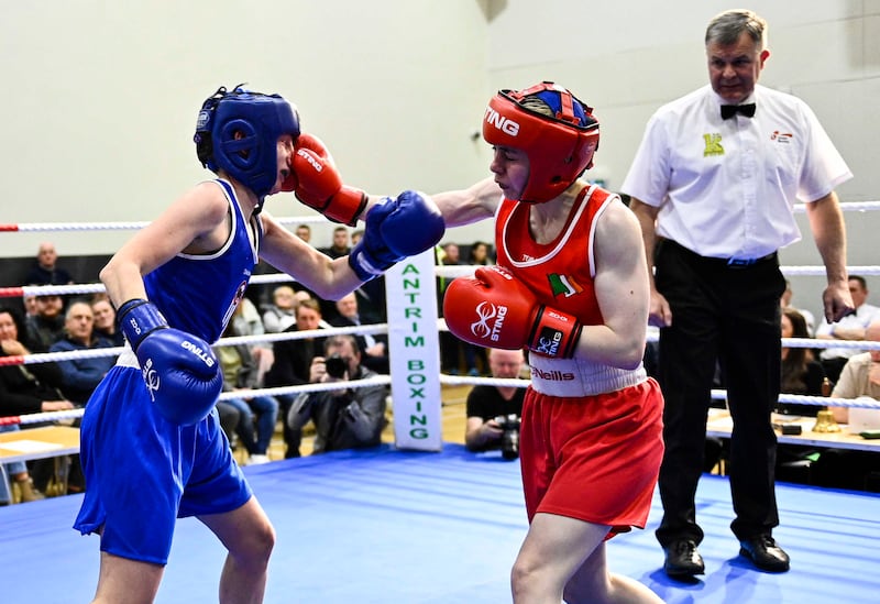 Oakleaf’s Carleigh Irving lands a right hand on Chloe Fleck during Friday's 48kg Ulster elite final. Picture by Mark Marlow