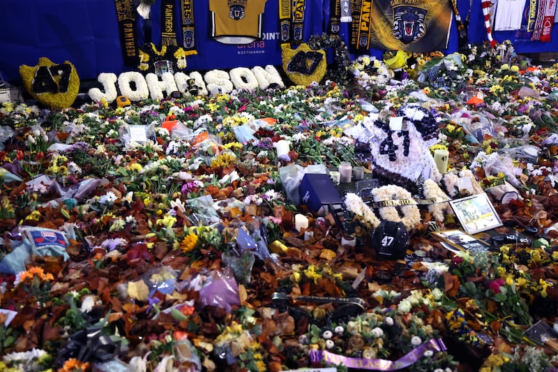 Floral tributes left in memory of Mr Johnson