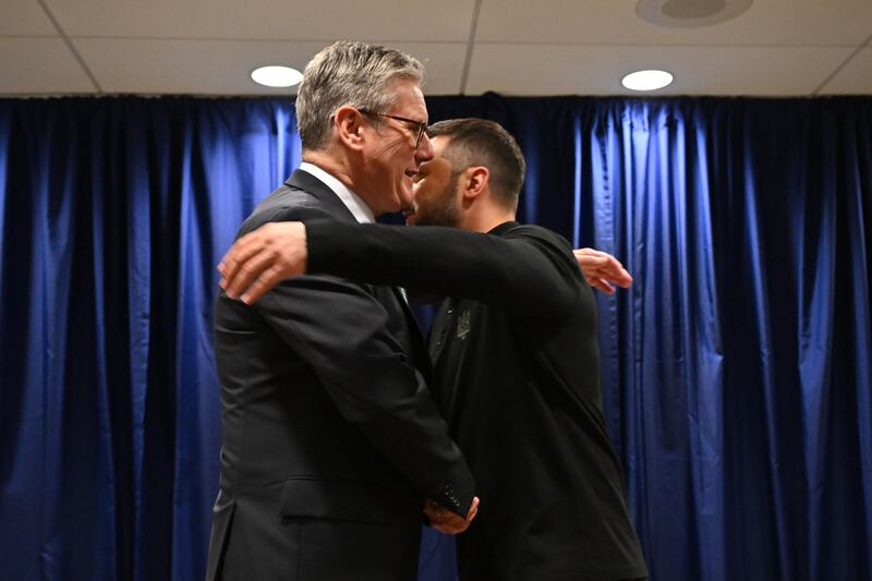 Prime Minister Sir Keir Starmer embraces Ukrainian President Volodymyr Zelensky during a meeting at the UN