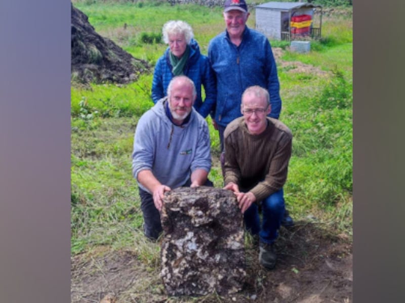 Paula Harvey, Tommy Boyle, Michael Boyle and Alan Moore with the 22kg bog butter