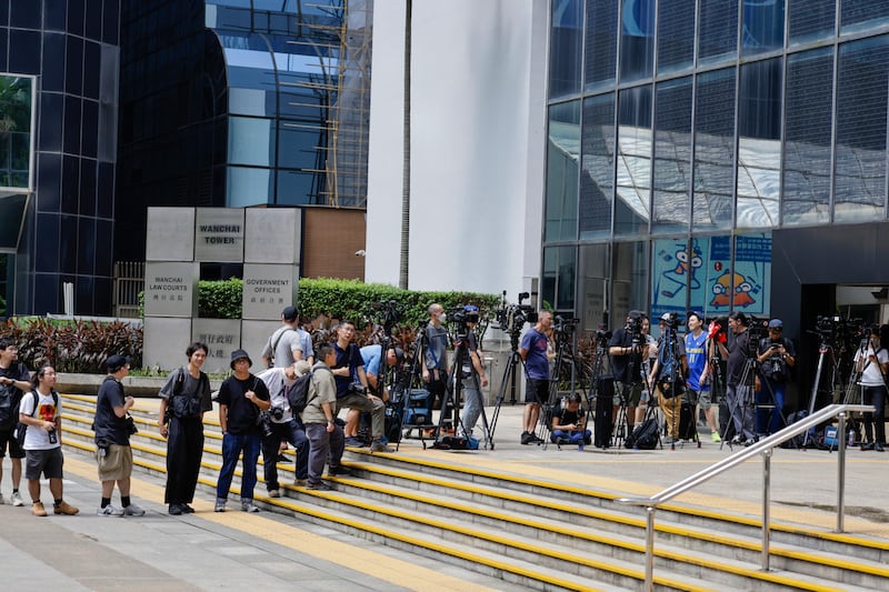 Media line up outside the District Court in Wan Chai, Hong Kong (May James/AP)