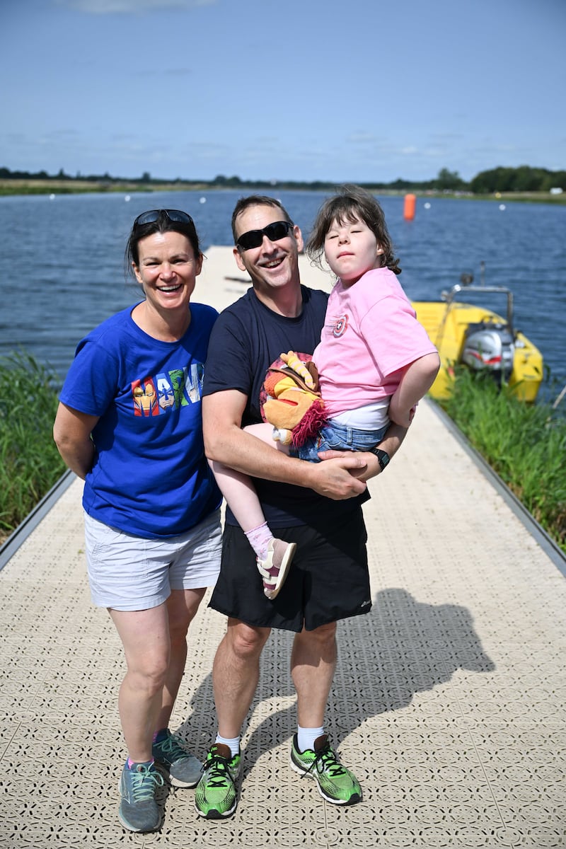 Eve Williams (right) with her father Steve and mother Jenni