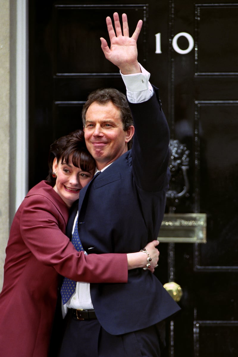 Sir Tony and Cherie Blair embrace in front of No 10 Downing Street after the Labour Leader was elected Prime Minister 27 years ago