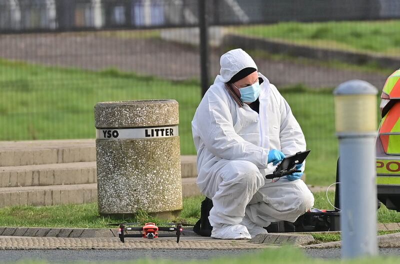 A forensics officer at work in the investigation into the attempted murder of DCI John Caldwell near Omagh. Picture by Pacemaker