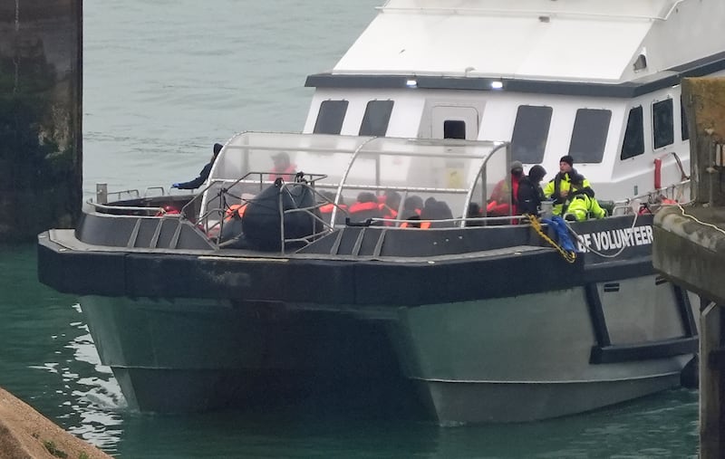 A group of people thought to be migrants are brought in to Dover, Kent, on board a Border Force vessel following a small boat incident in the Channel