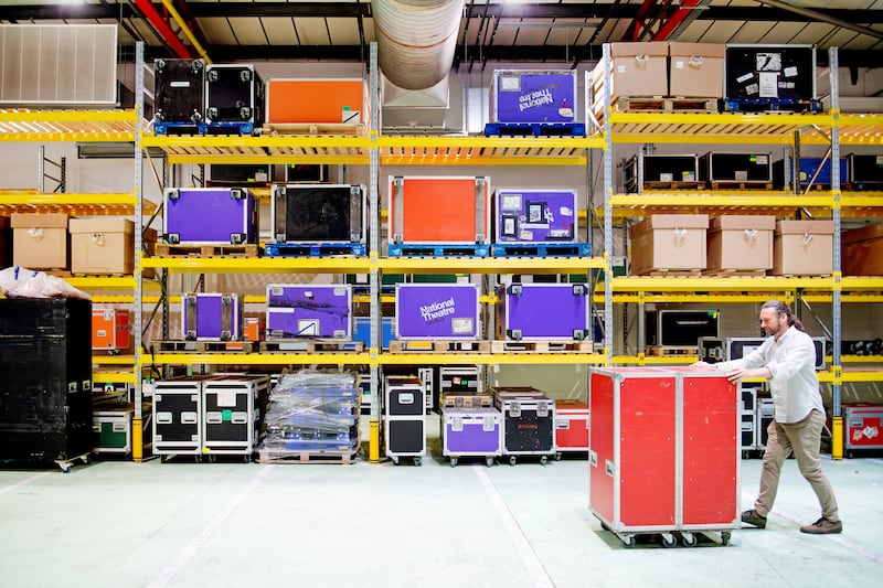 A worker storing production materials in the warehouse in Bermondsey, London. (Reed Watts Architects)