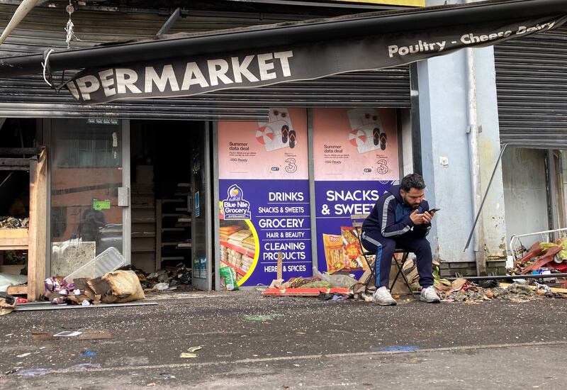 Abdelkader Mohamad Al Alloush, owner of the Sham Supermarket on Donegall Road in Belfast, after it was burned on Saturday night and attacked again on Monday