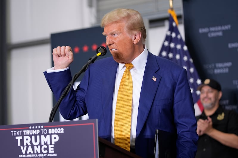 Republican presidential nominee former President Donald Trump gestures after a news conference at Austin-Bergstrom International Airport on Friday (Alex Brandon/AP)