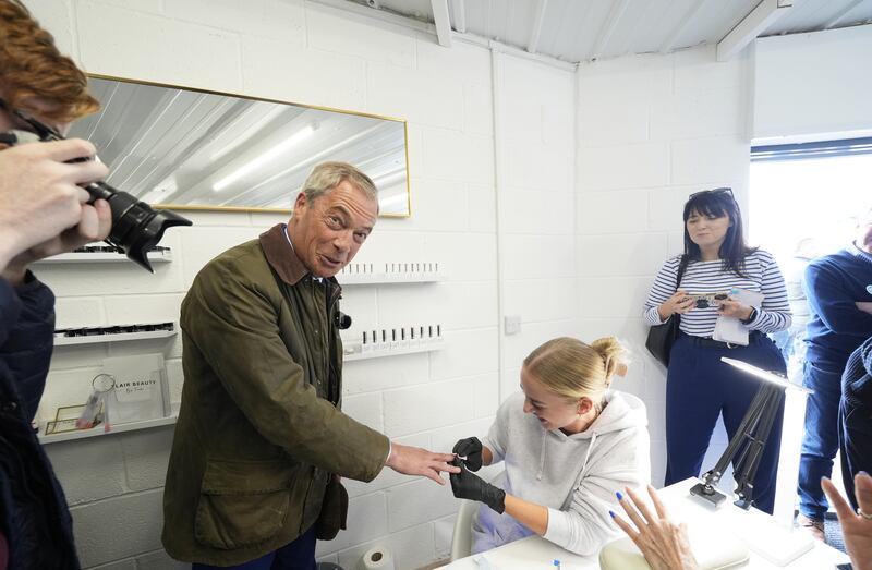 Reform UK leader Nigel Farage has a nail painted at On The Lash beauty salon, in Hoyland, Barnsley
