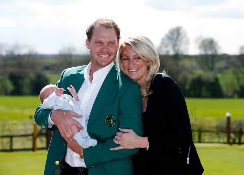 Masters champion Danny Willett, his wife Nicole and son Zach during a photocall at Lindrick Golf Club