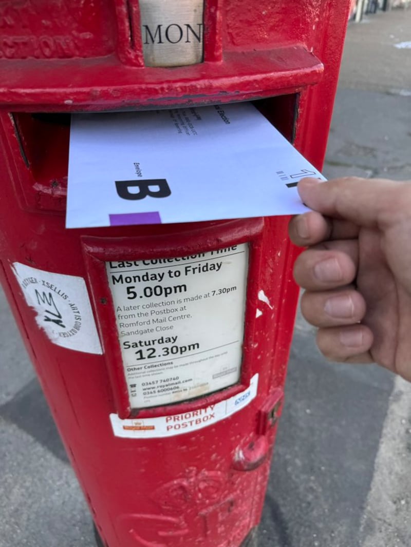 Simon Darvill casting his vote by post