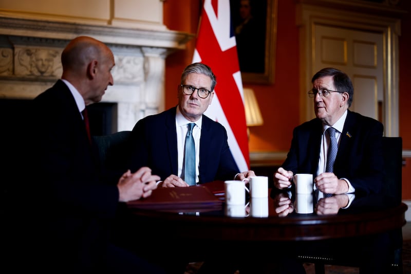 Sir Keir Starmer with Defence Secretary John Healey and former Nato chief Lord Robertson