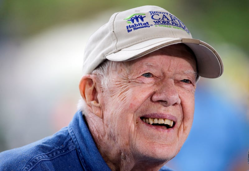 Tributes paid to Jimmy Carter focus as much on his humanitarian work after leaving the White House as what he did as president from 1977 to 1981 (Mark Humphrey/AP)