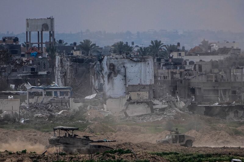 Israeli soldiers operate inside the Gaza Strip (Ariel Schalit/AP)